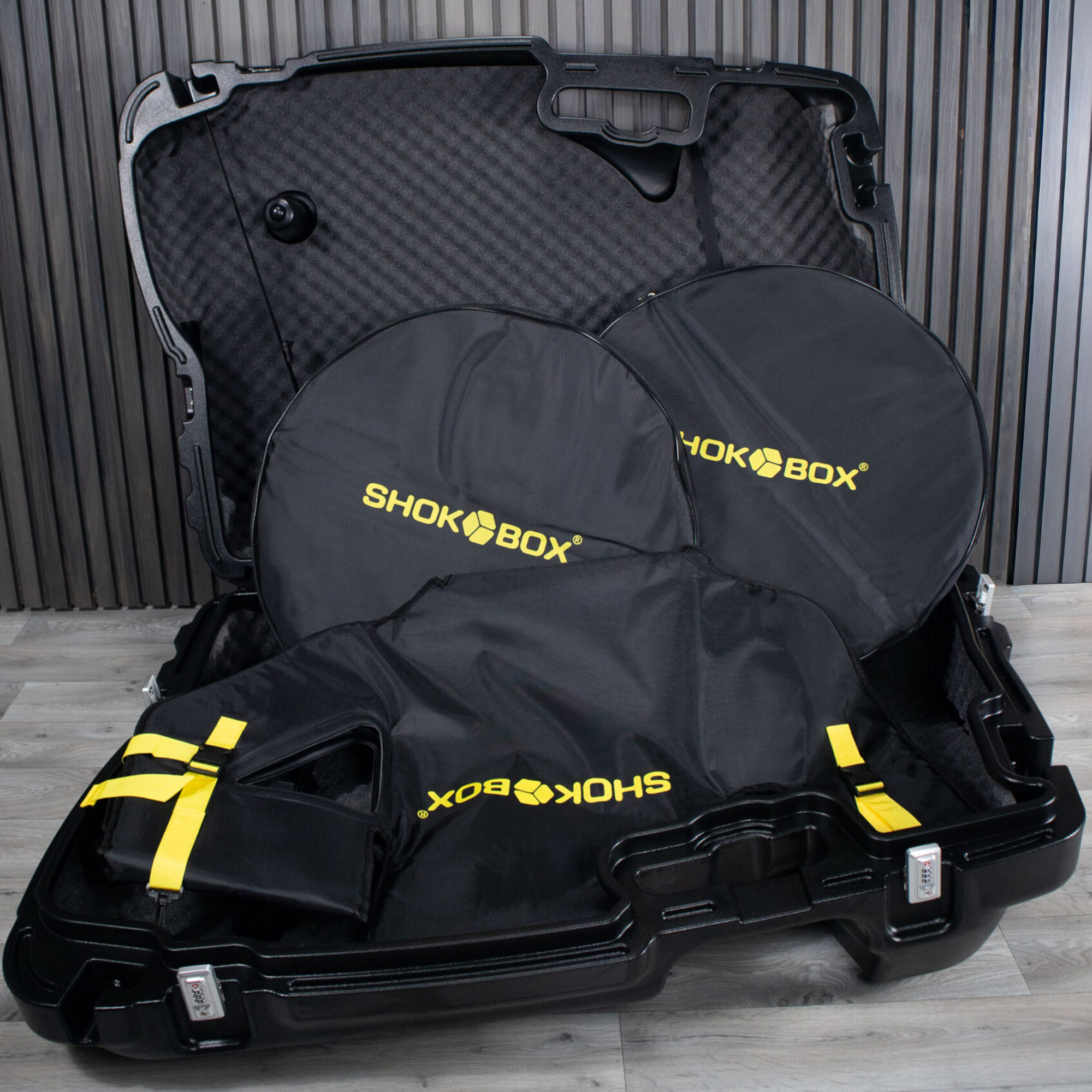 Open Shokbox® Pro with Ride Rug and padded wheel bags arranged inside