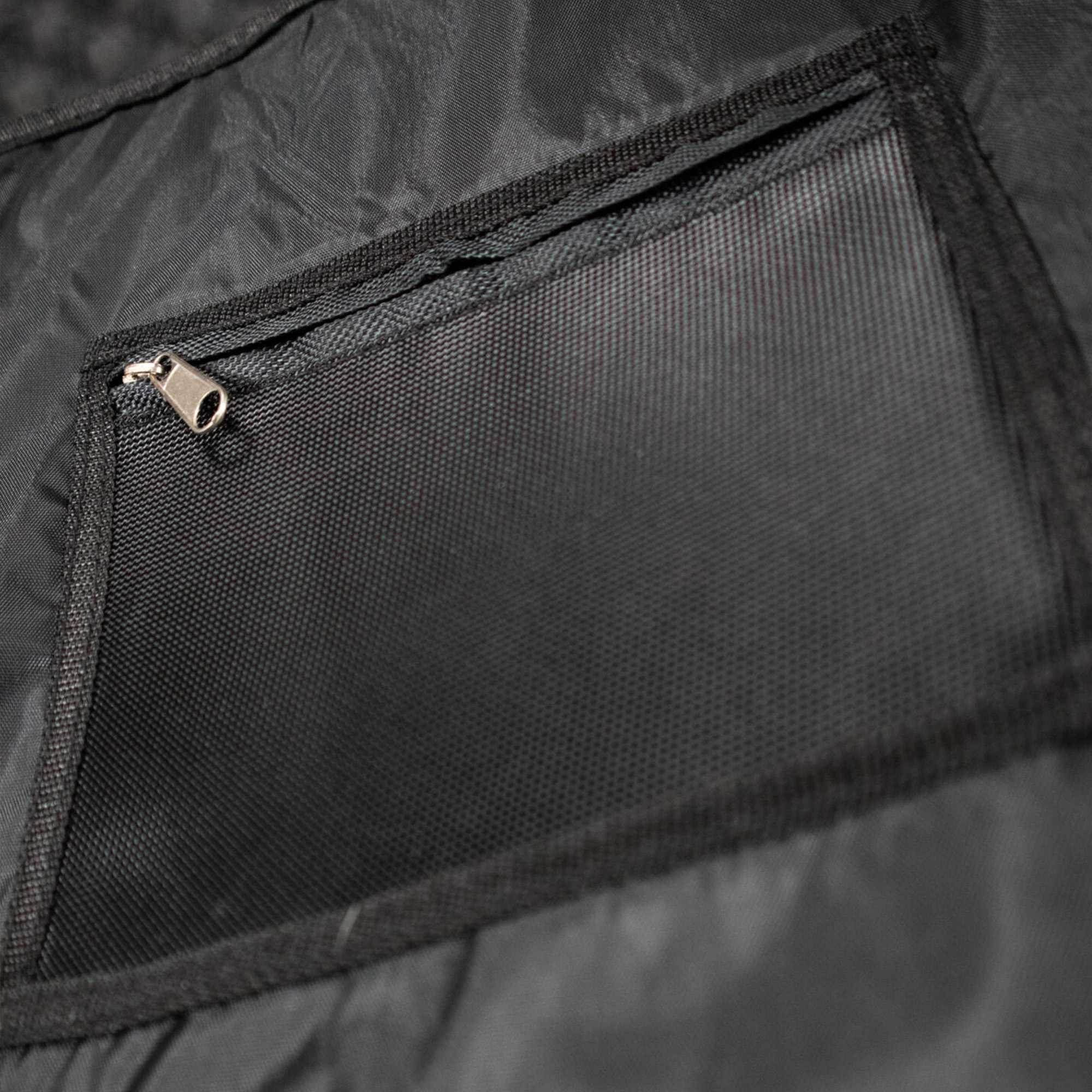 Zipped storage pocket inside a Shokbox® padded wheel bag